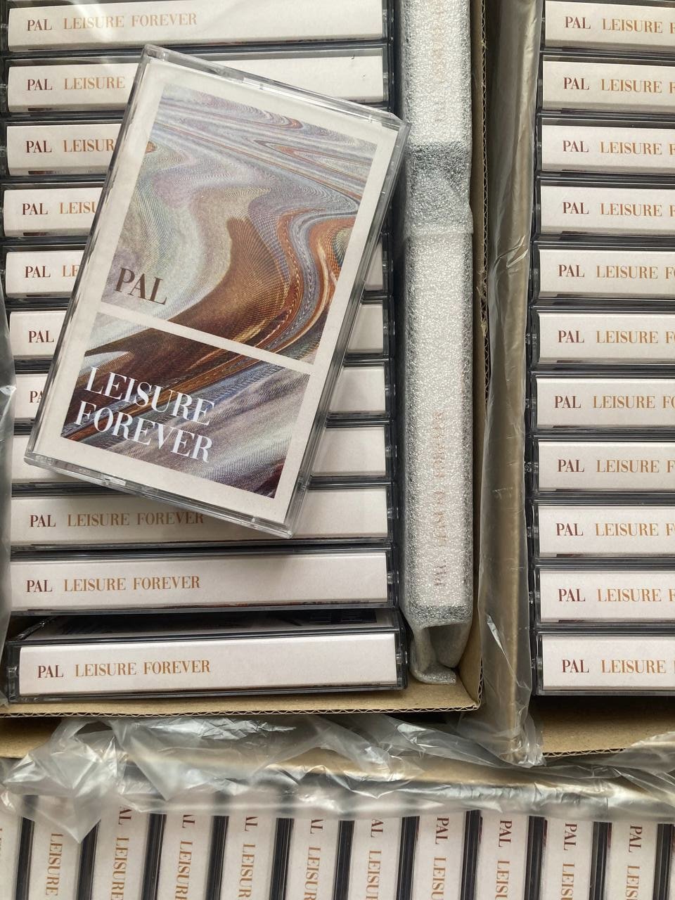 Presentation detail of the 'Leisure Forever' cassette.